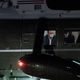 White House social media director Dan Scavino, left, wears a face mask as he accompanies President Donald Trump, right, aboard Marine One as they depart, Thursday, Oct. 1, 2020, at Andrews Air Force Base, Md.